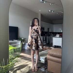 Elegant Floral Midi Dress in Black and Brown